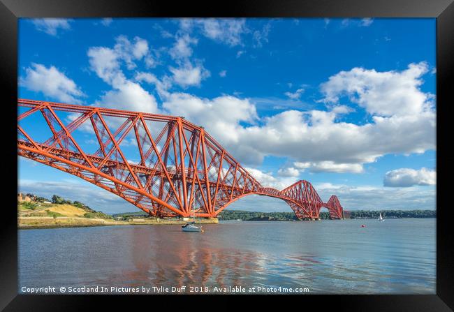 Sailing Boat At Anchor Beneath The Forth Bridge Framed Print by Tylie Duff Photo Art