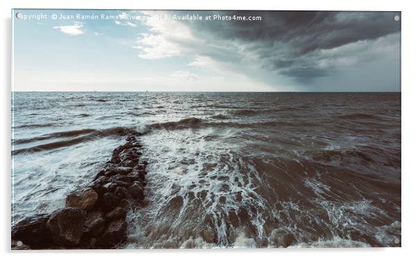 Rocks in the sea with storm sky on the beach Acrylic by Juan Ramón Ramos Rivero