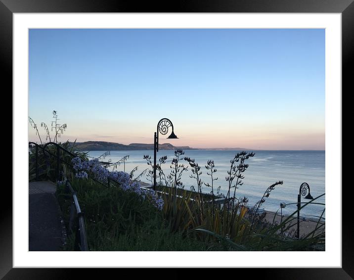 Sunset over Lyme Regis Framed Mounted Print by suzie Attaway