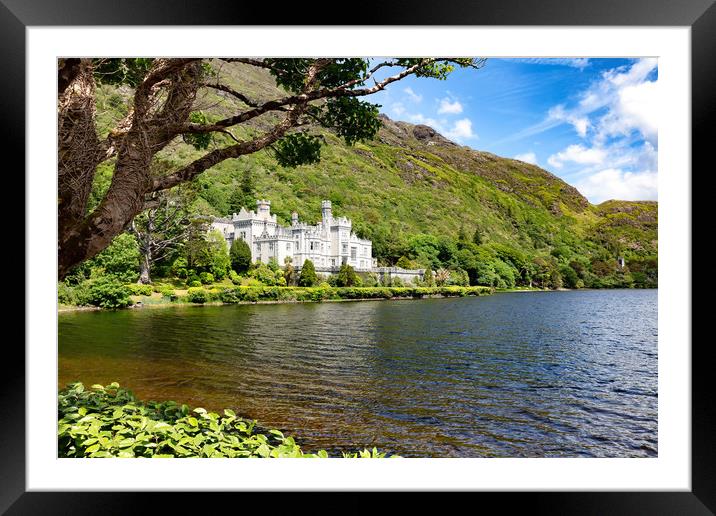 Kylemore Abbey in Connemara mountains with lake in Framed Mounted Print by Thomas Baker