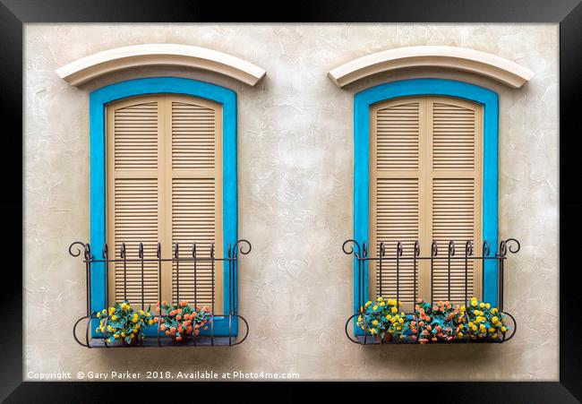 Two quaint windows, with bright blue frames Framed Print by Gary Parker