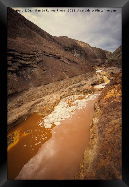 Orange acidic water with low PH between the cliff Framed Print by Juan Ramón Ramos Rivero