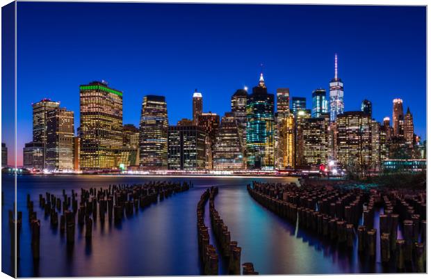 The New York City Skyline at night from DUMBO Broo Canvas Print by George Robertson