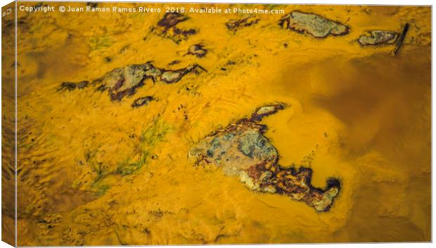 Yellow waters with colored stones Canvas Print by Juan Ramón Ramos Rivero