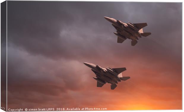 Two low flying F-15E Strike Eagles at sunset Canvas Print by Simon Bratt LRPS