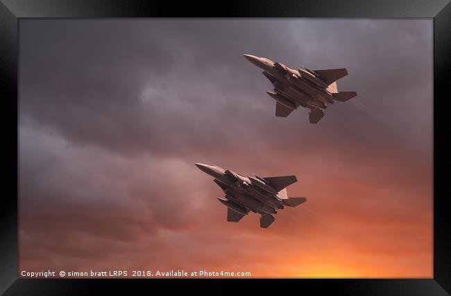 Two low flying F-15E Strike Eagles at sunset Framed Print by Simon Bratt LRPS