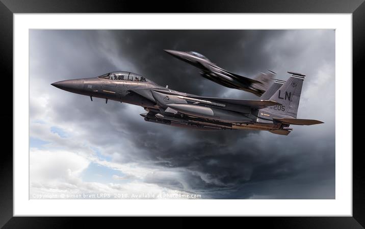 Two fighter jets close up in storm clouds Framed Mounted Print by Simon Bratt LRPS
