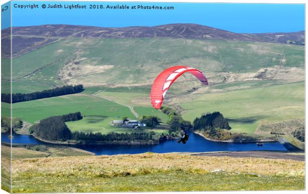 PARAGLIDING OFF SNAEFEL Canvas Print by Judith Lightfoot