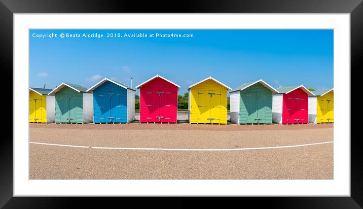 Colorful wooden beach huts in Eastbourne Framed Mounted Print by Beata Aldridge