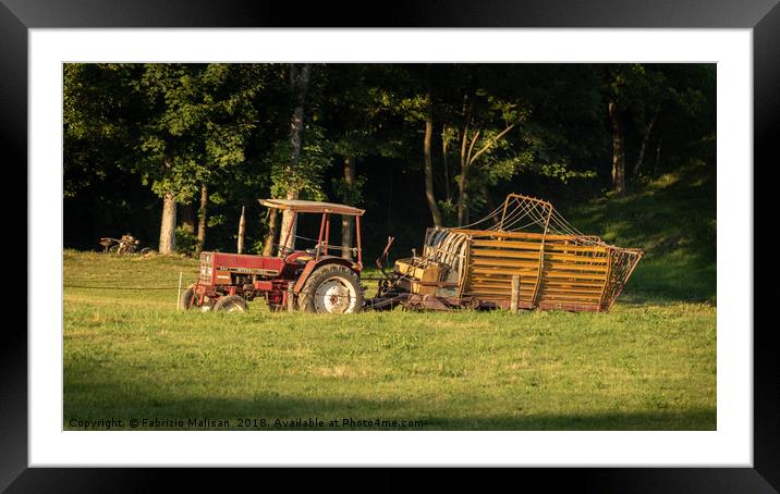 Tractor in the field Framed Mounted Print by Fabrizio Malisan