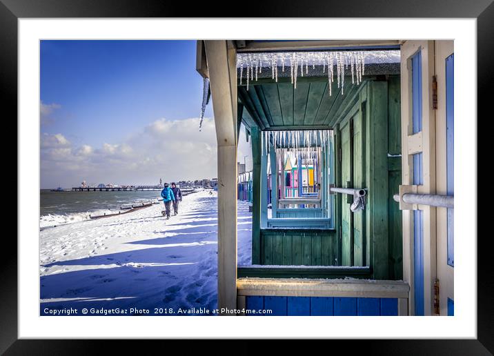 Icicles through the Beach Huts on a Winters day Framed Mounted Print by GadgetGaz Photo