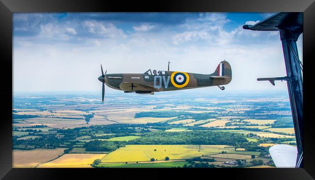 A Spitfire on the Wingtip Framed Print by Mike Lanning