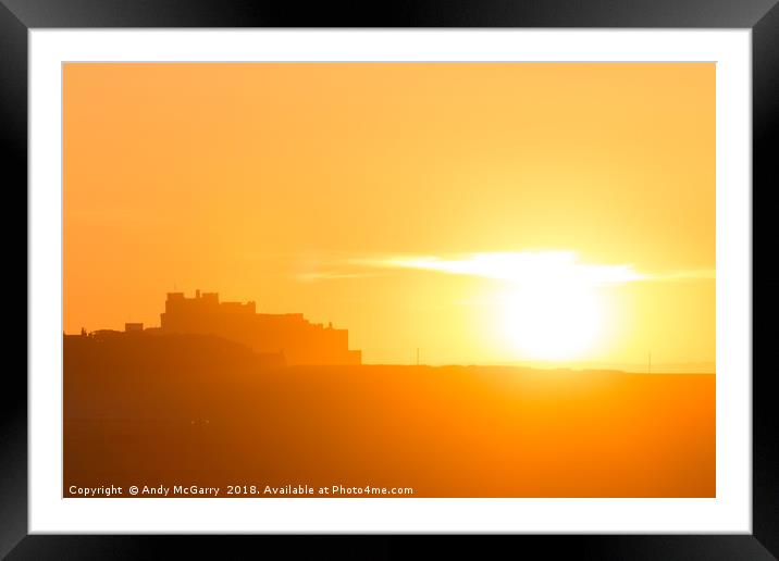 Bamburgh Castle Sunset Framed Mounted Print by Andy McGarry