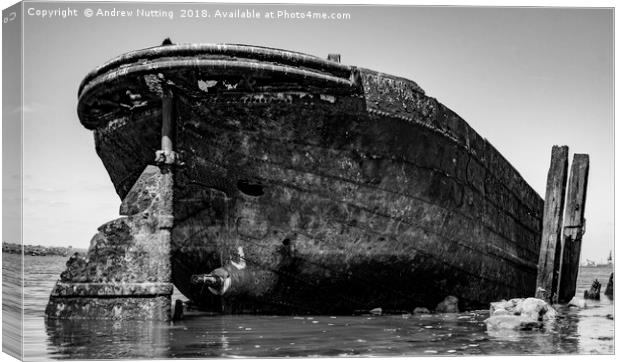 Rusting barge  Canvas Print by Andrew Nutting