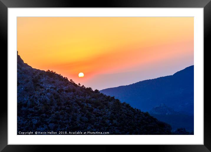 Sunset over the mountains  Framed Mounted Print by Kevin Hellon