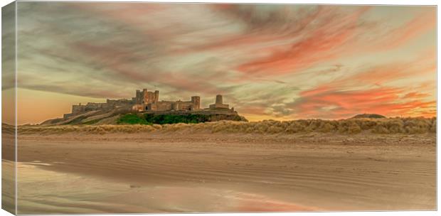 Bamburgh Castle fiery Sunset Canvas Print by Naylor's Photography