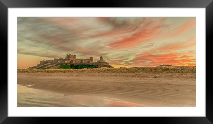 Bamburgh Castle fiery Sunset Framed Mounted Print by Naylor's Photography