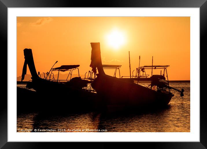 Silhouettes of long tail fishing boats, Pak Meng,  Framed Mounted Print by Kevin Hellon