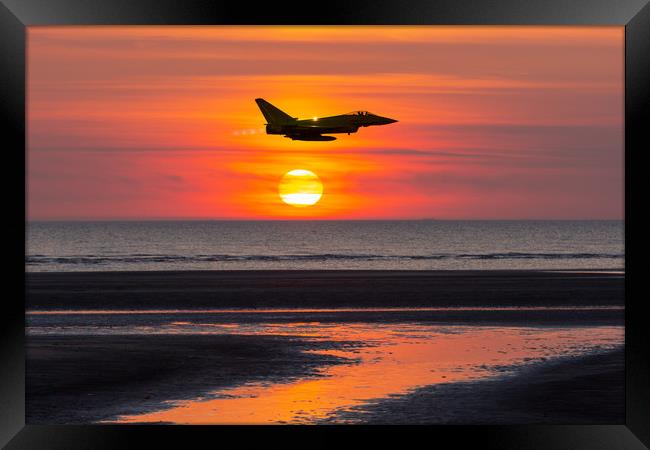 Typhoon at Sunset Framed Print by Roger Green
