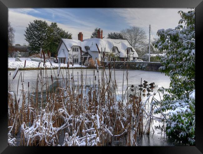 The old English cottage in winters Snow Framed Print by Philip Brown