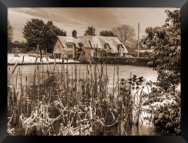 The old English cottage in winters Snow - Sepia Ve Framed Print by Philip Brown