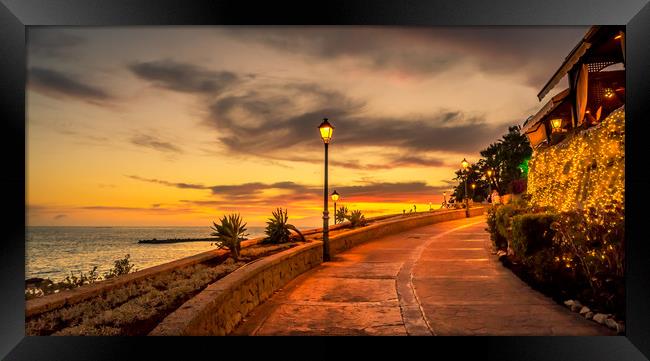 Walking the promenade at night Framed Print by Naylor's Photography