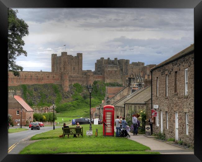 Bamburgh Village and Castle - Colour Framed Print by Philip Brown