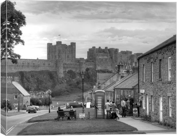 Bamburgh Village and Castle - Black & White Canvas Print by Philip Brown