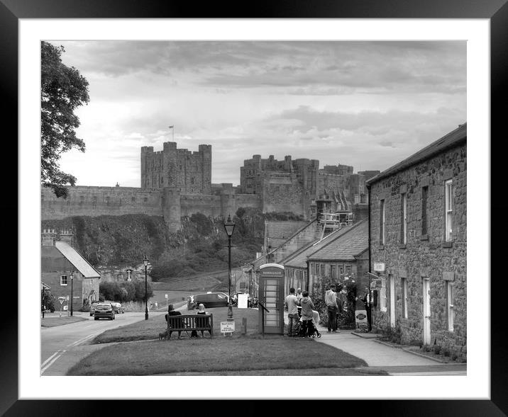 Bamburgh Village and Castle - Black & White Framed Mounted Print by Philip Brown