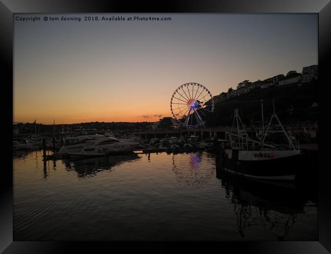 Sunset over Riviera wheel Framed Print by tom downing