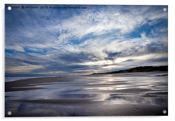 Cloudy blue sky reflected in the wet sand at Druri Acrylic by Jim Jones