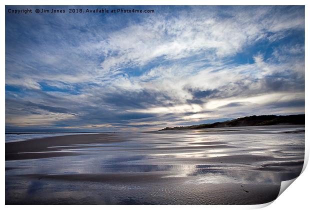 Cloudy blue sky reflected in the wet sand at Druri Print by Jim Jones