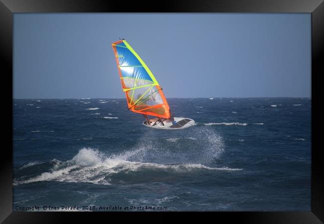 Windsurfer jumping in the waves Framed Print by Ines Porada