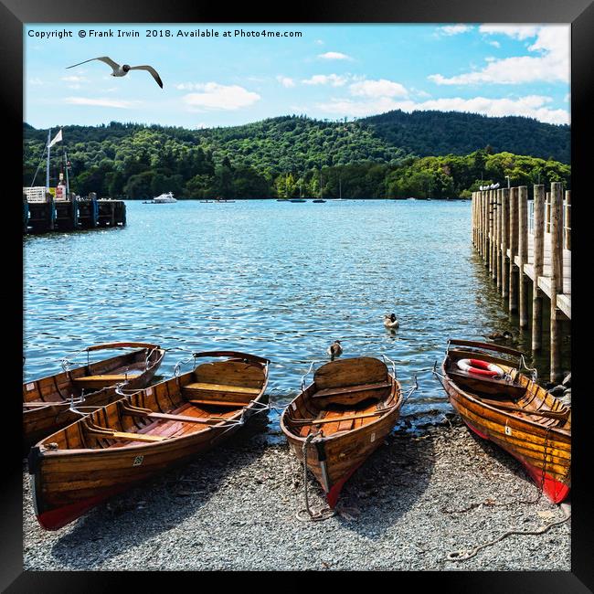 Rowing boats moored on Windermere. Framed Print by Frank Irwin
