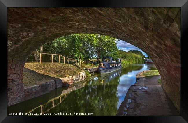 Under The Bridge At Pewsey Wharf Framed Print by Ian Lewis