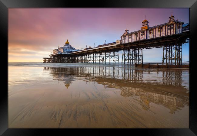 Reflections at sunrise (Eastbourne Pier) Framed Print by Andrew Ray