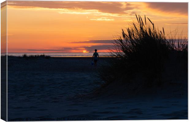Lone Boy at sunset Canvas Print by Simon Wilkinson