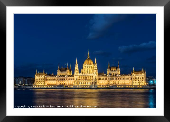 The parliament building at sunset in Budapest. Framed Mounted Print by Sergio Delle Vedove