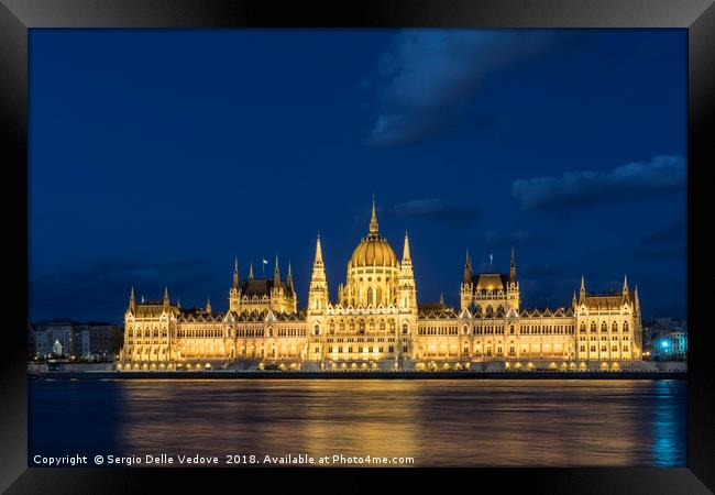 The parliament building at sunset in Budapest. Framed Print by Sergio Delle Vedove