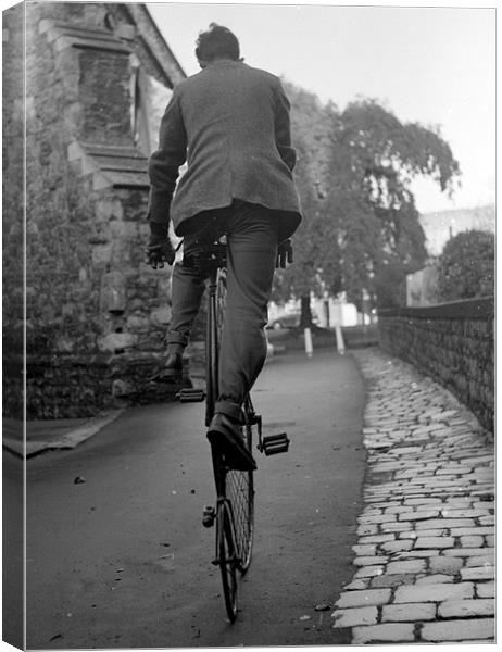Conquering the Classic Penny Farthing Canvas Print by David Pankhurst