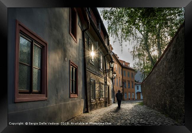 A man walking in Mala Strana  district in Prague,  Framed Print by Sergio Delle Vedove