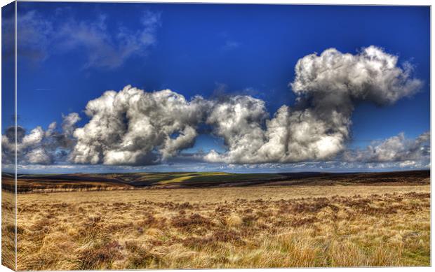 Cumulus Clouds Over Exmoor Canvas Print by Mike Gorton