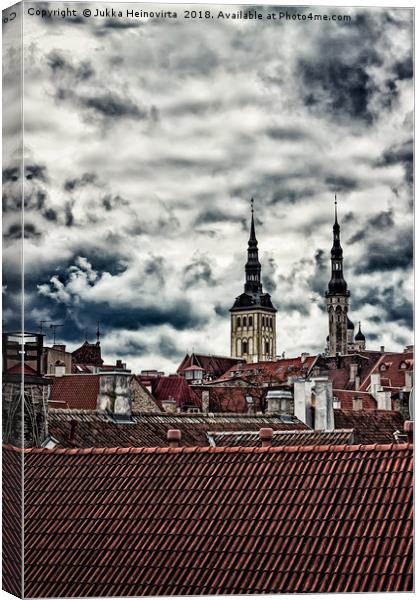 Church Towers Behind The Rooftops Canvas Print by Jukka Heinovirta
