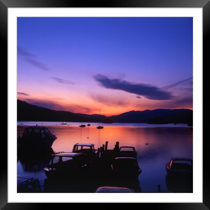 Boat Jetty  at sunset on  Windermere, Cumbria, UK Framed Mounted Print by Maggie McCall
