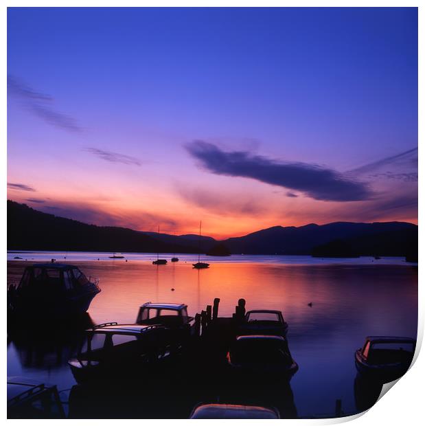 Boat Jetty  at sunset on  Windermere, Cumbria, UK Print by Maggie McCall