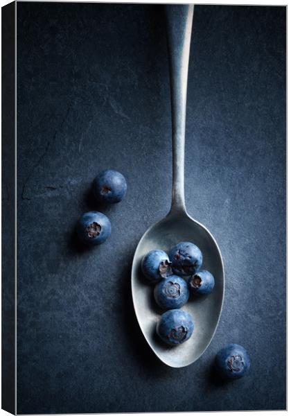 Blueberries on spoon Still Life Canvas Print by Johan Swanepoel