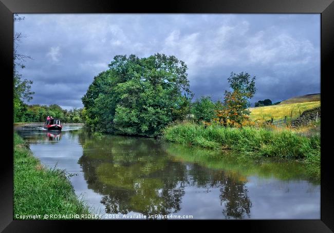 "Heading back ahead of the storm" Framed Print by ROS RIDLEY