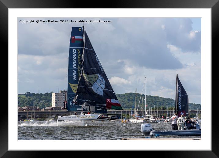 Extreme Sailing - A Catamaran uses its hydrofoils  Framed Mounted Print by Gary Parker