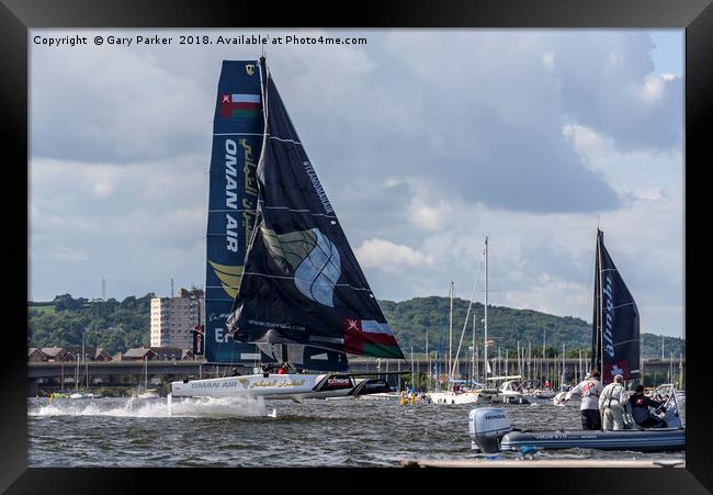 Extreme Sailing - A Catamaran uses its hydrofoils  Framed Print by Gary Parker