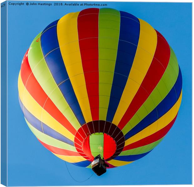 Serene Striped Balloon Soaring Canvas Print by John Hastings